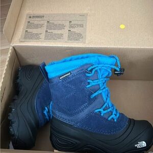 The North Face Blue and Black Winter Boots